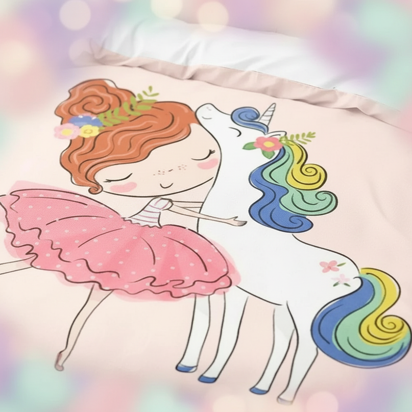 girl hugging unicorn bedding - detail