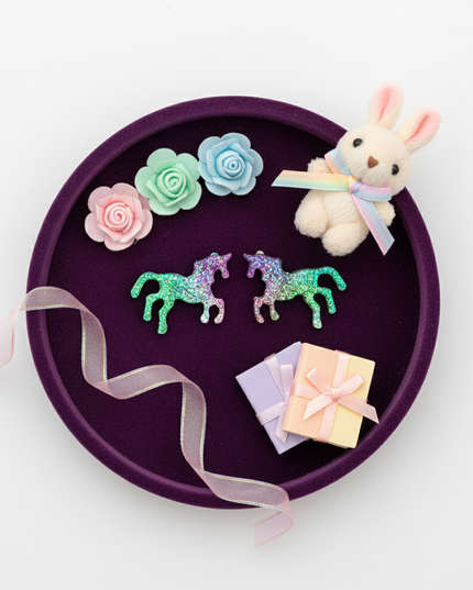 glitter unicorn earrings - flat-lay