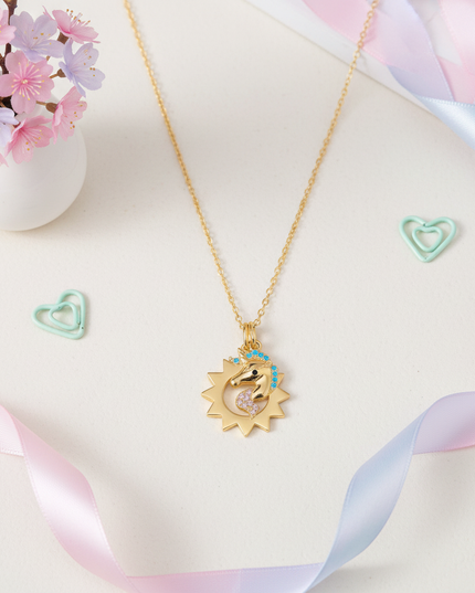 glitter unicorn necklace - flat-lay