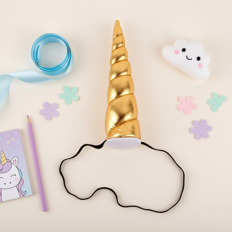 gold unicorn horn headband - flat-lay