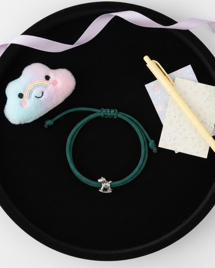 green unicorn bracelet - flat-lay