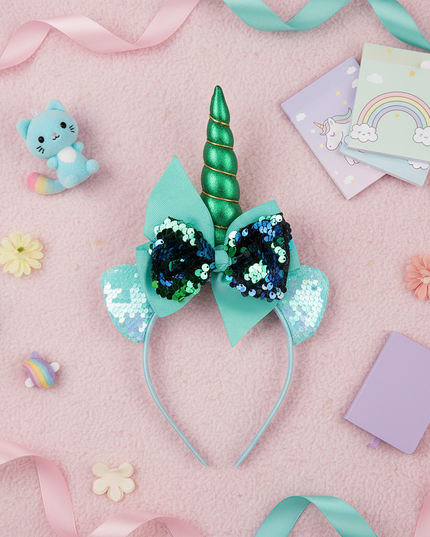 green unicorn headband for kids - flat-lay