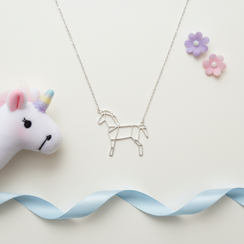 horse unicorn necklace - flat-lay