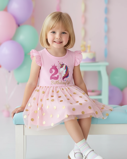 infant unicorn dress - sitting