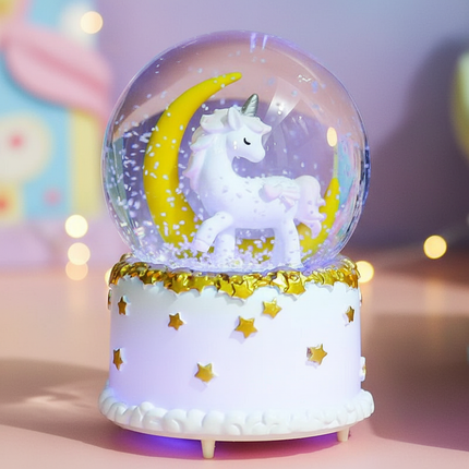 large unicorn snow globe - lifestyle