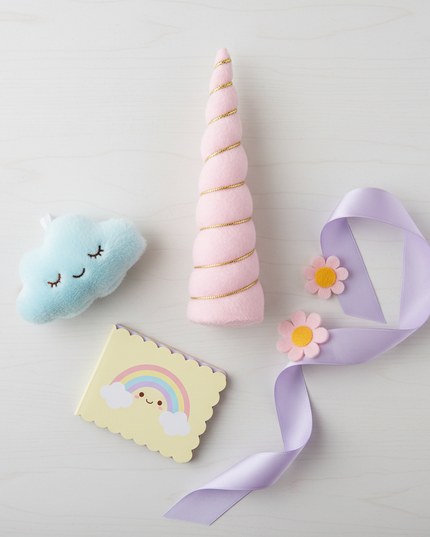 light pink unicorn horn - flat-lay