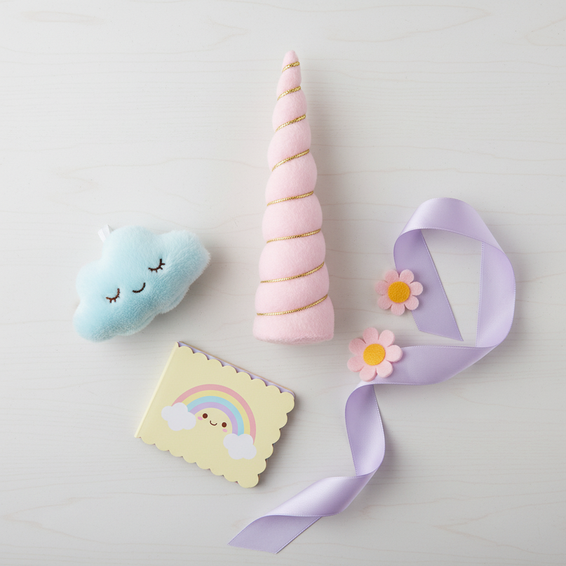 light pink unicorn horn - flat-lay