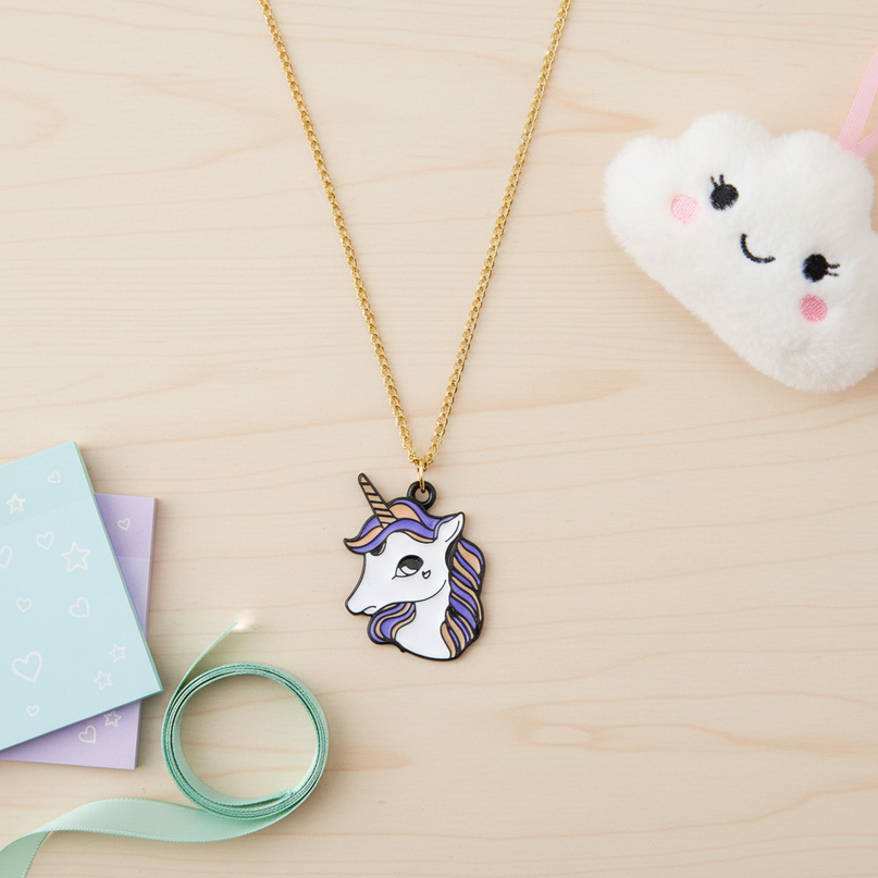 lovely unicorn necklace - flat-lay
