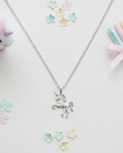 majestic unicorn necklace - flat-lay