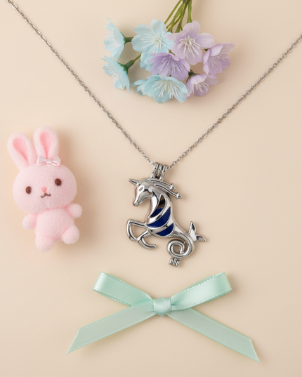 mermaid unicorn necklace - flat-lay