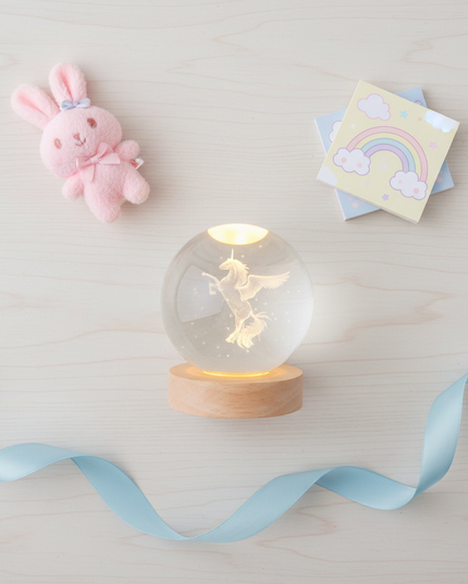 mini unicorn snow globe - flat-lay