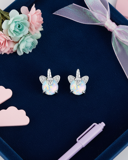 opal unicorn earrings - flat-lay