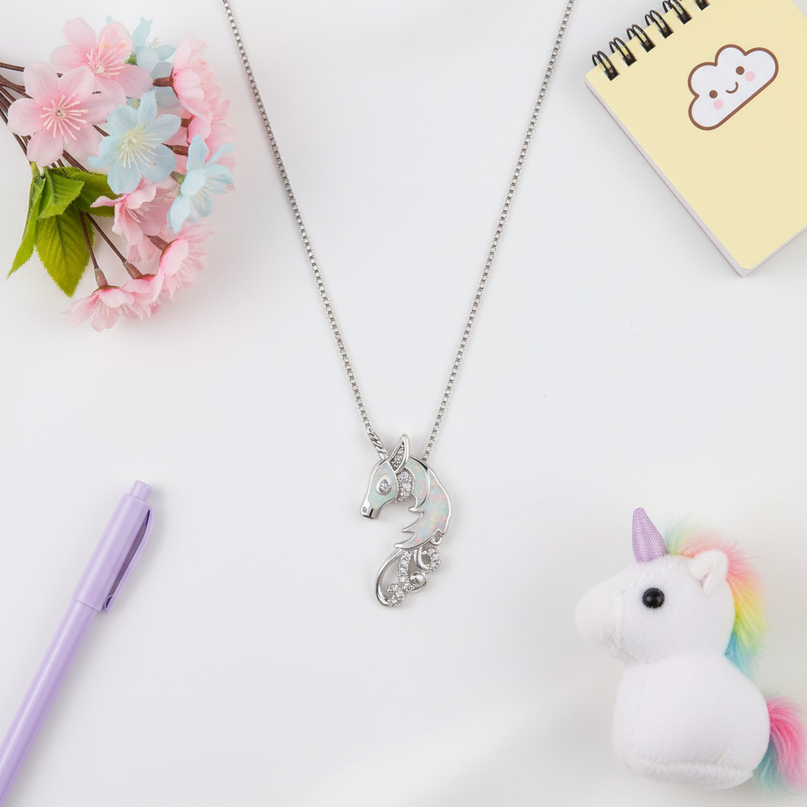 opal unicorn necklace - flat-lay