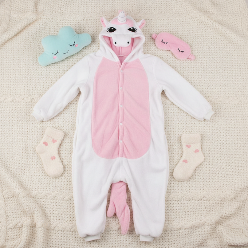 pink and white unicorn onesie - flat-lay