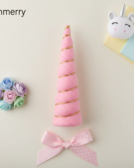 pink felt unicorn horn set - flat-lay