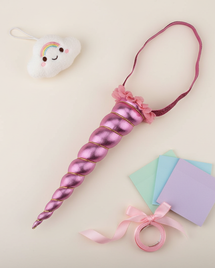 pink glitter unicorn horn headband - flat-lay