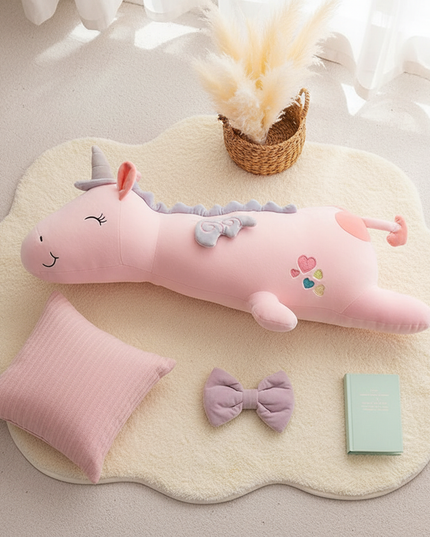 pink led unicorn plush - flat-lay