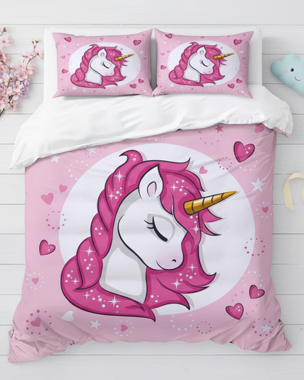 pink sleeping heart unicorn bedding - flat-lay