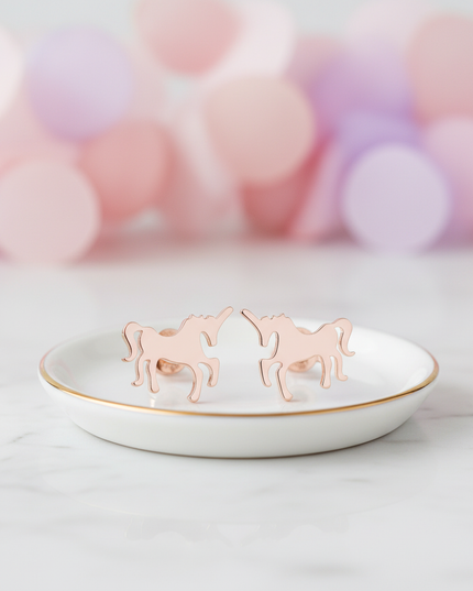 pink steel unicorn earrings - lifestyle