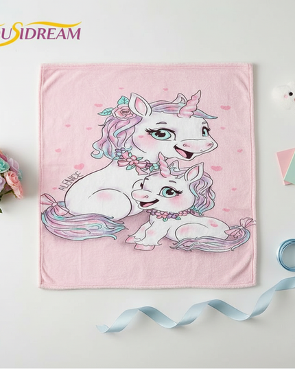 pink unicorn blanket - flat-lay
