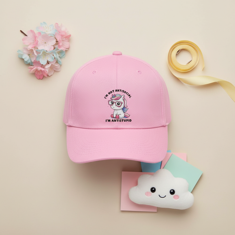 pink unicorn cap - flat-lay