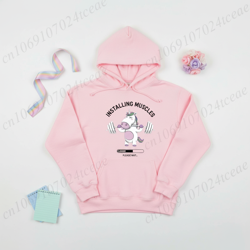 pink unicorn gym hoodie - flat-lay