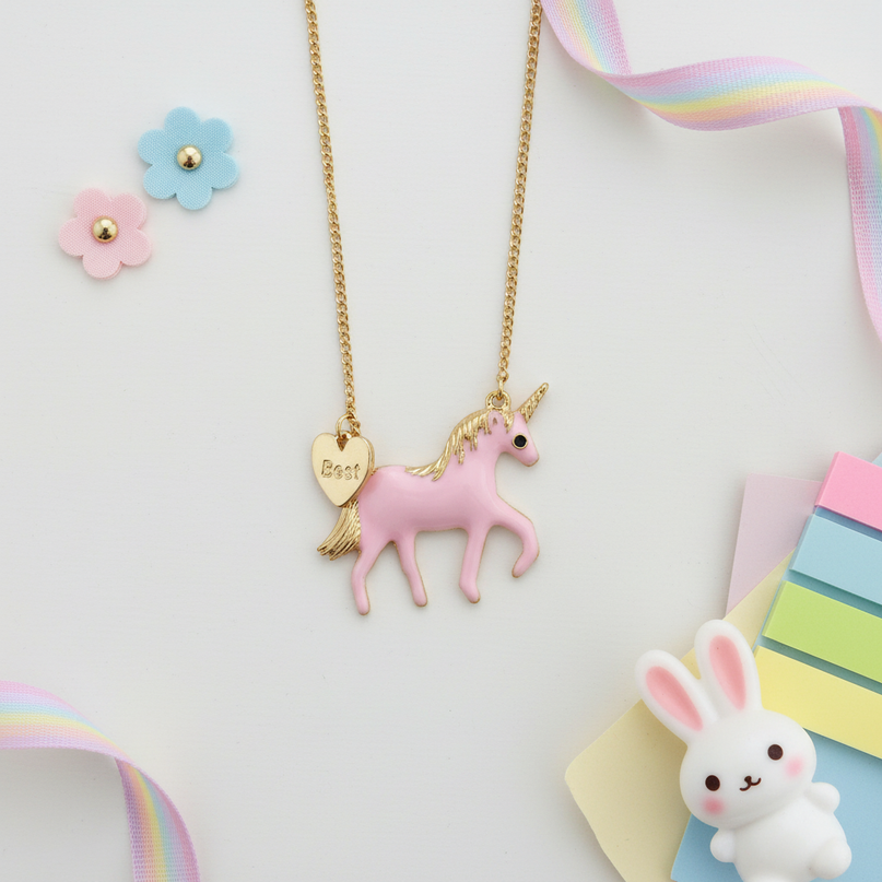 pink unicorn necklace - flat-lay