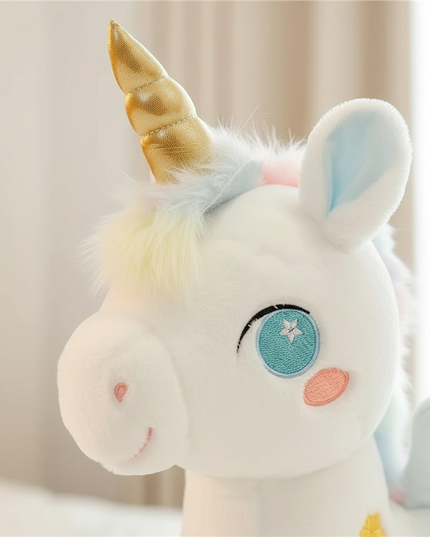 pink unicorn plush stuffed animal - detail