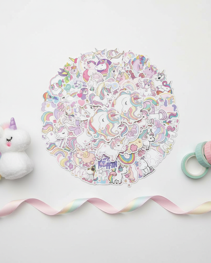 pink unicorn stickers - flat-lay