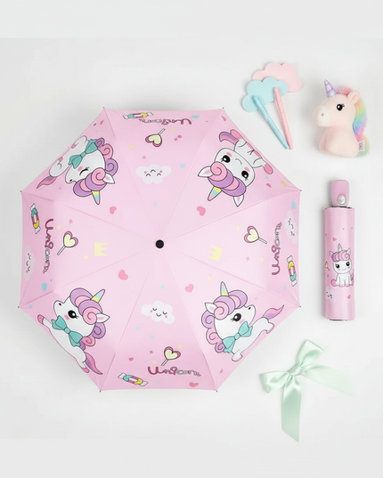 pink unicorn umbrella - flat-lay