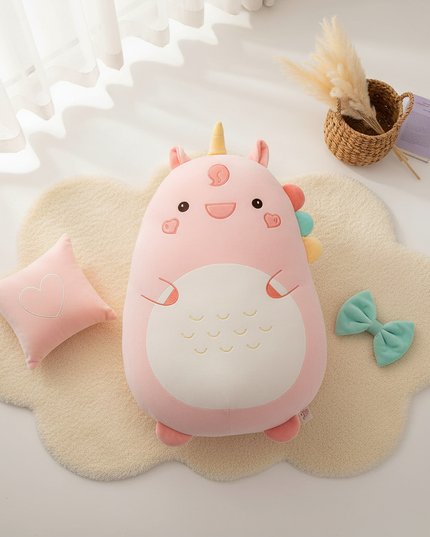 plush unicorn pillow - flat-lay