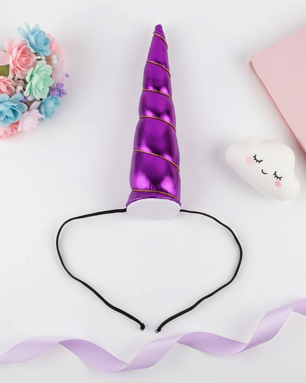 purple elastic unicorn horn - flat-lay