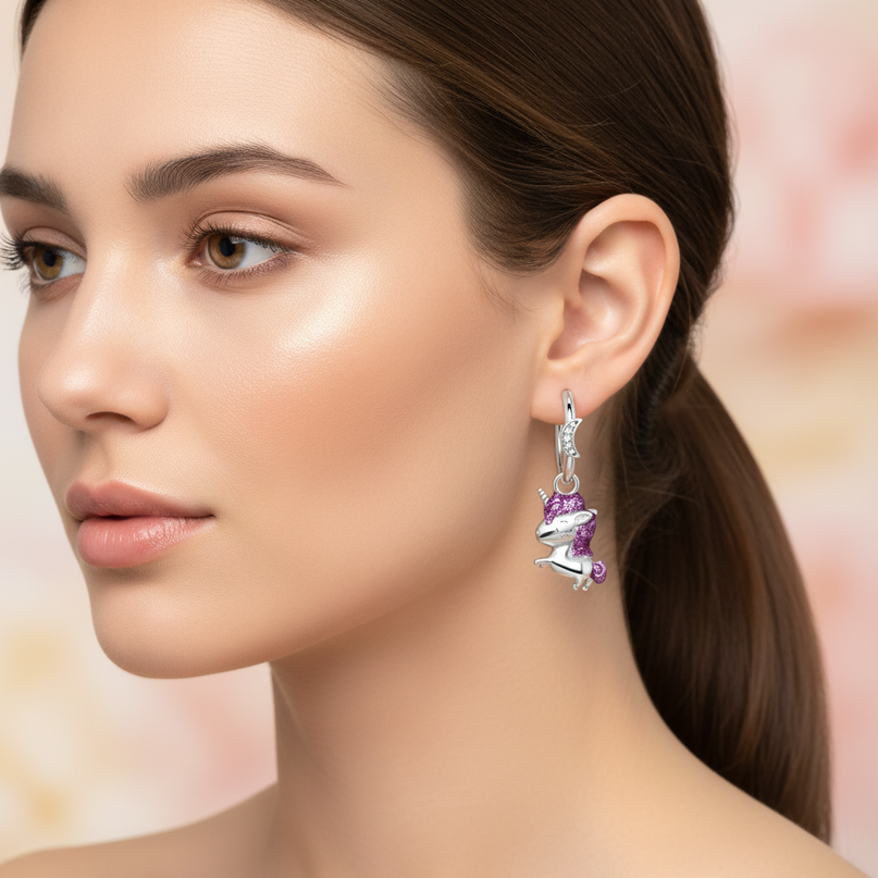 real silver unicorn earrings - in-use