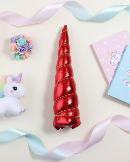 red metallic unicorn horn set - flat-lay