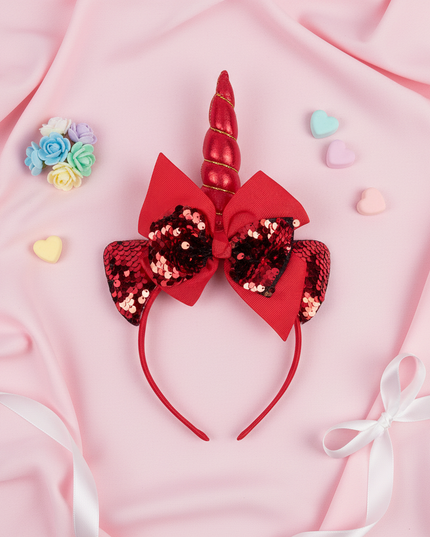 red unicorn headband for party - flat-lay