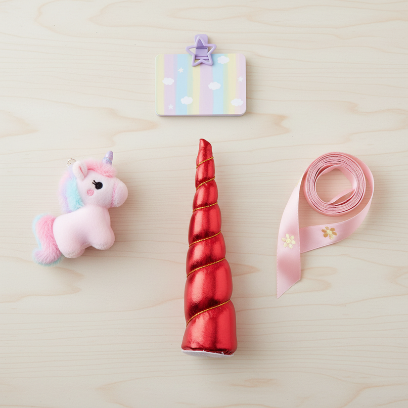 red unicorn horn party pack - flat-lay
