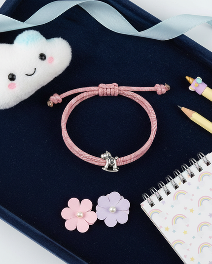 pink unicorn bracelet - flat-lay