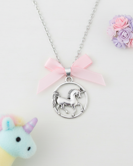 round unicorn necklace - flat-lay