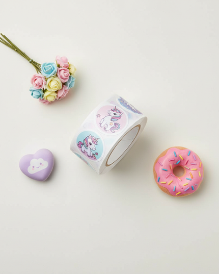 round unicorn stickers - flat-lay