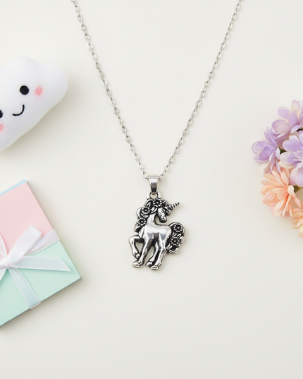 royal unicorn necklace - flat-lay