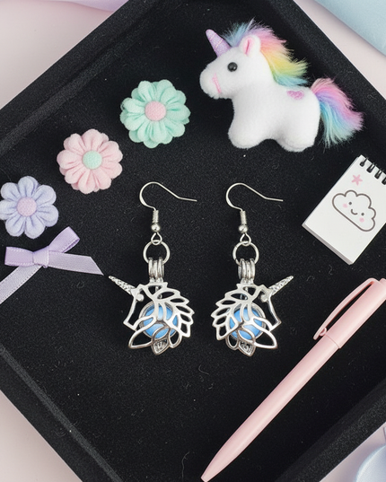 shiny unicorn earrings - flat-lay