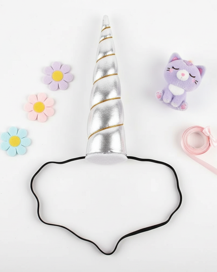 silver elastic unicorn horn - flat-lay