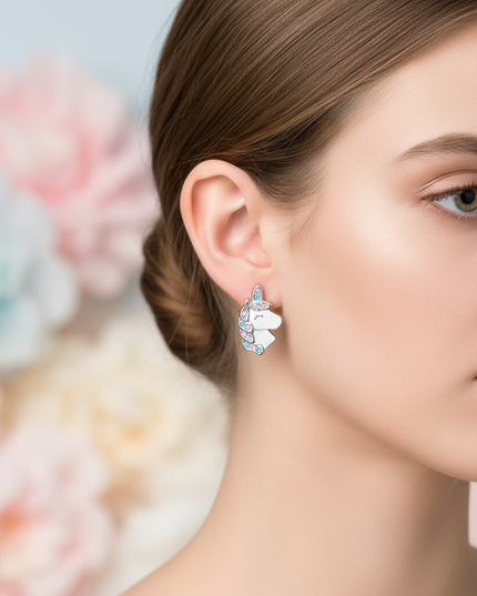 silver unicorn stud earrings - in-use
