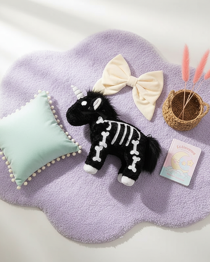 skeleton unicorn plush - flat-lay