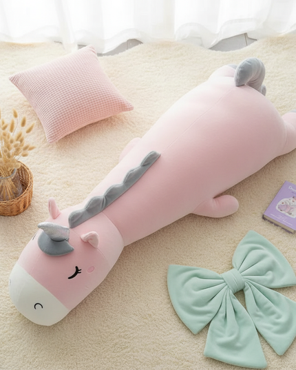 sleeping unicorn plush - flat-lay