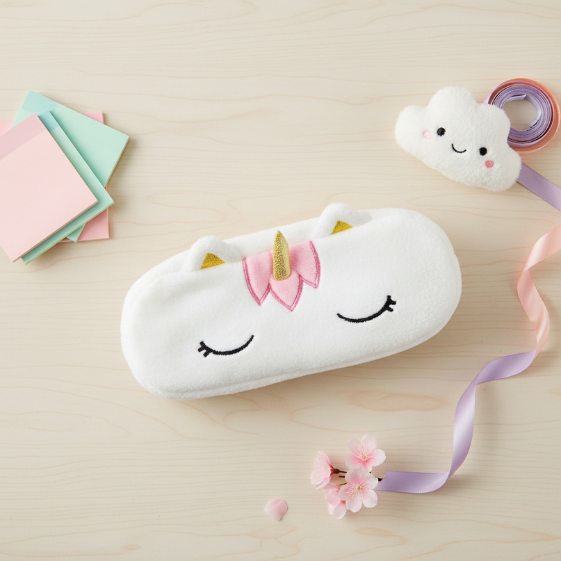sleepy unicorn pencil case - flat-lay