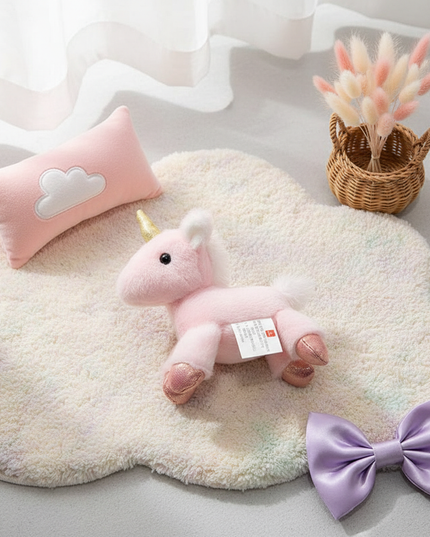 small pink plush unicorn - flat-lay