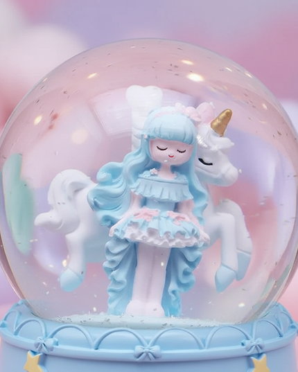 snow globe with unicorn - detail