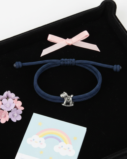 stainless steel unicorn bracelet - flat-lay
