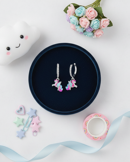 sterling silver unicorn earrings - flat-lay